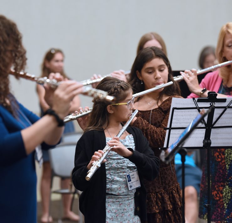 Suzuki teachers played alongside students during the flute choir rehearsal in preparation for the Youth Flute Day concert Credit Tim Trumble