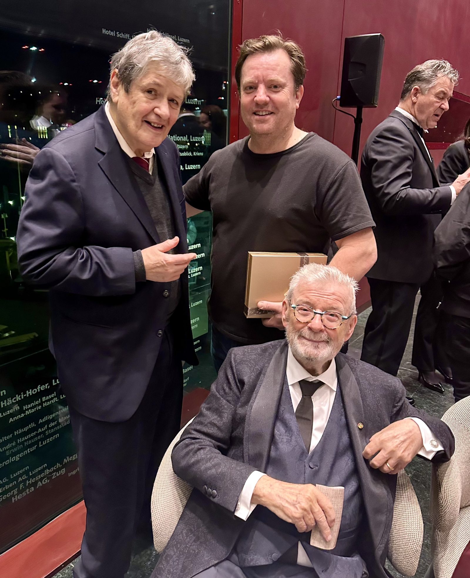 Phillip Moll, Gareth Davies, and Sir James at the 85th birthday celebration